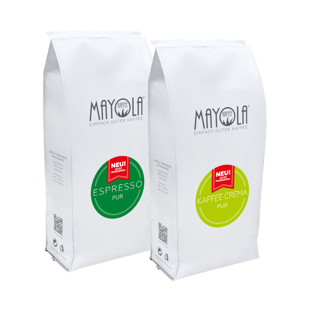 Zwei weiße Kaffeetüten von MAYOLA mit grünen Etiketten in den Sorten 